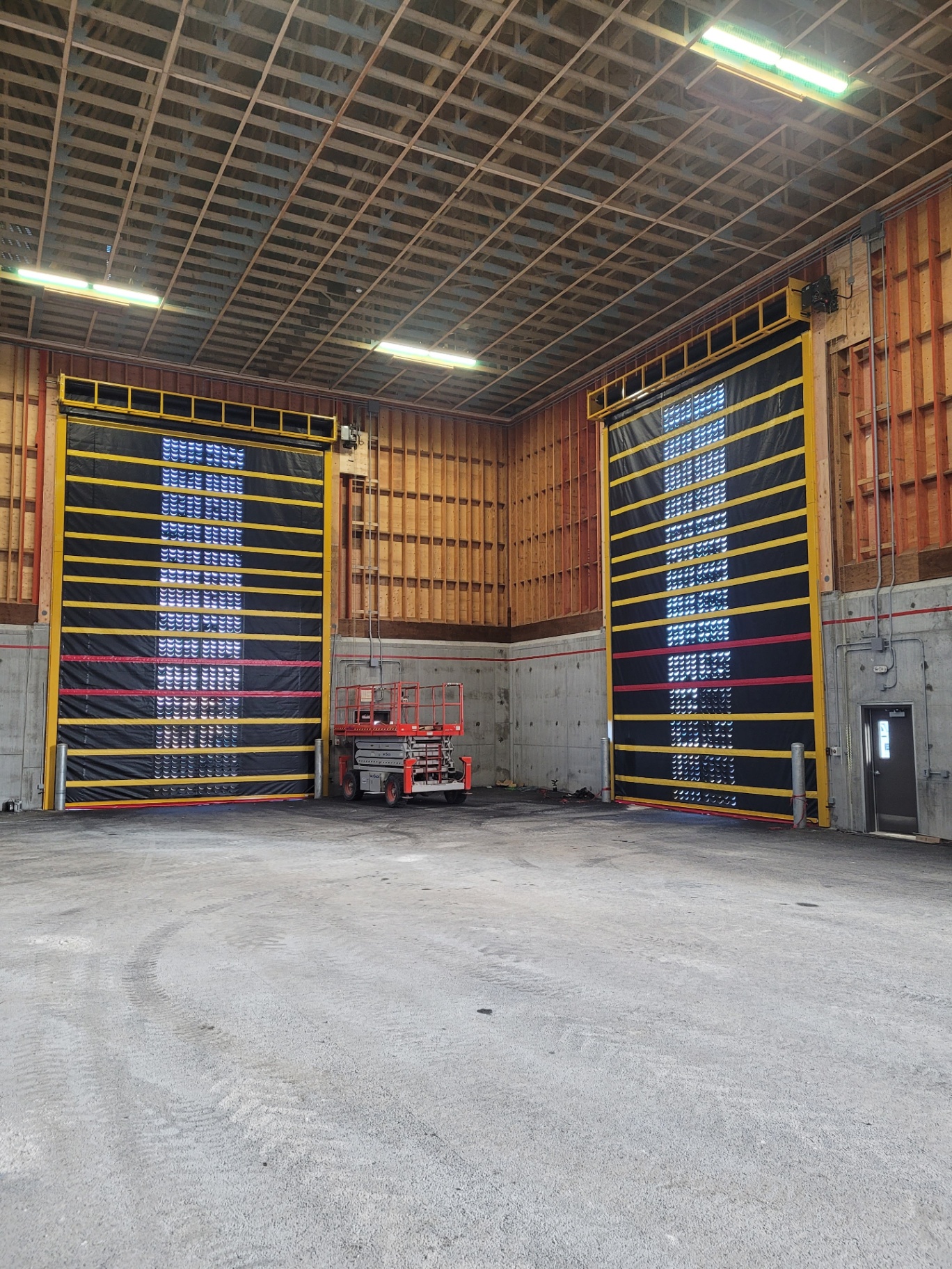 Porte à enroulement Norac avec brise-vent